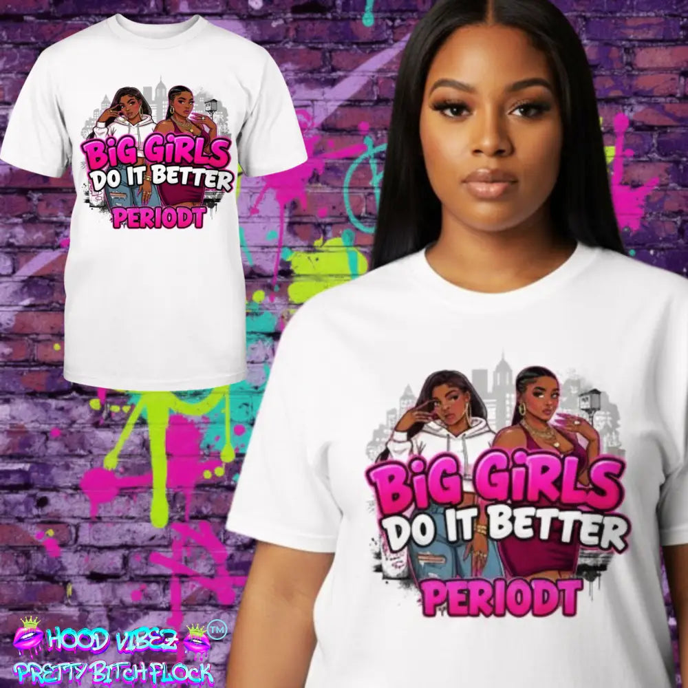 Woman wearing a white t-shirt with 'Big Girls Do It Better Period' design against a colorful graffiti wall.