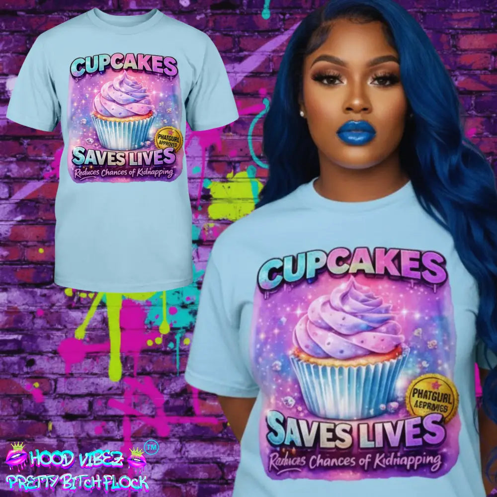 Cupcakes Saves Lives graphic tee featuring pastel cupcake illustration on blue t-shirt, funny cute women’s statement shirt by Hood Vibez Pretty Bitch Flock streetwear brand.