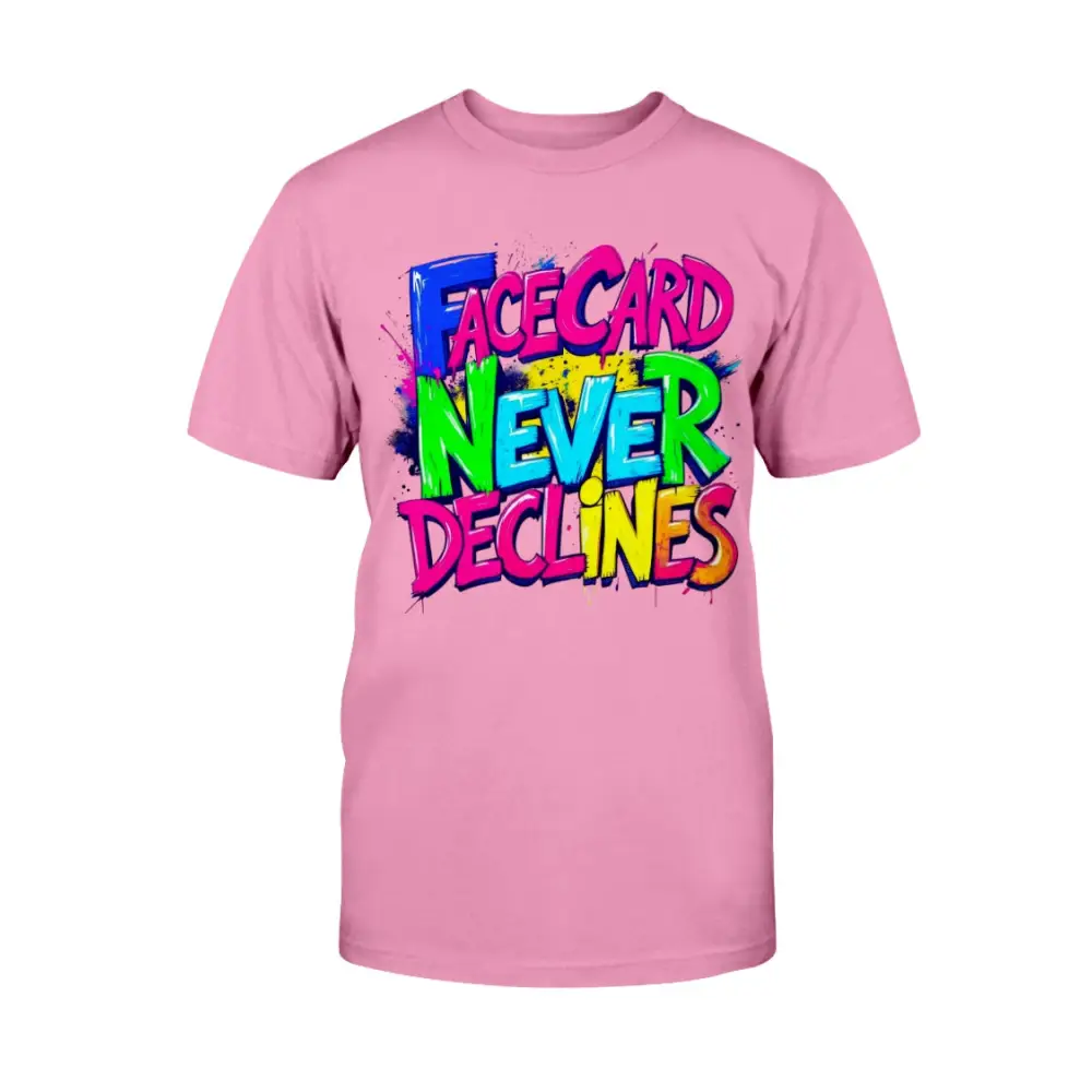 A pink unisex t-shirt featuring bold, colorful graffiti-style lettering that reads “Face Card Never Declines” in neon pink, blue, green, and yellow.