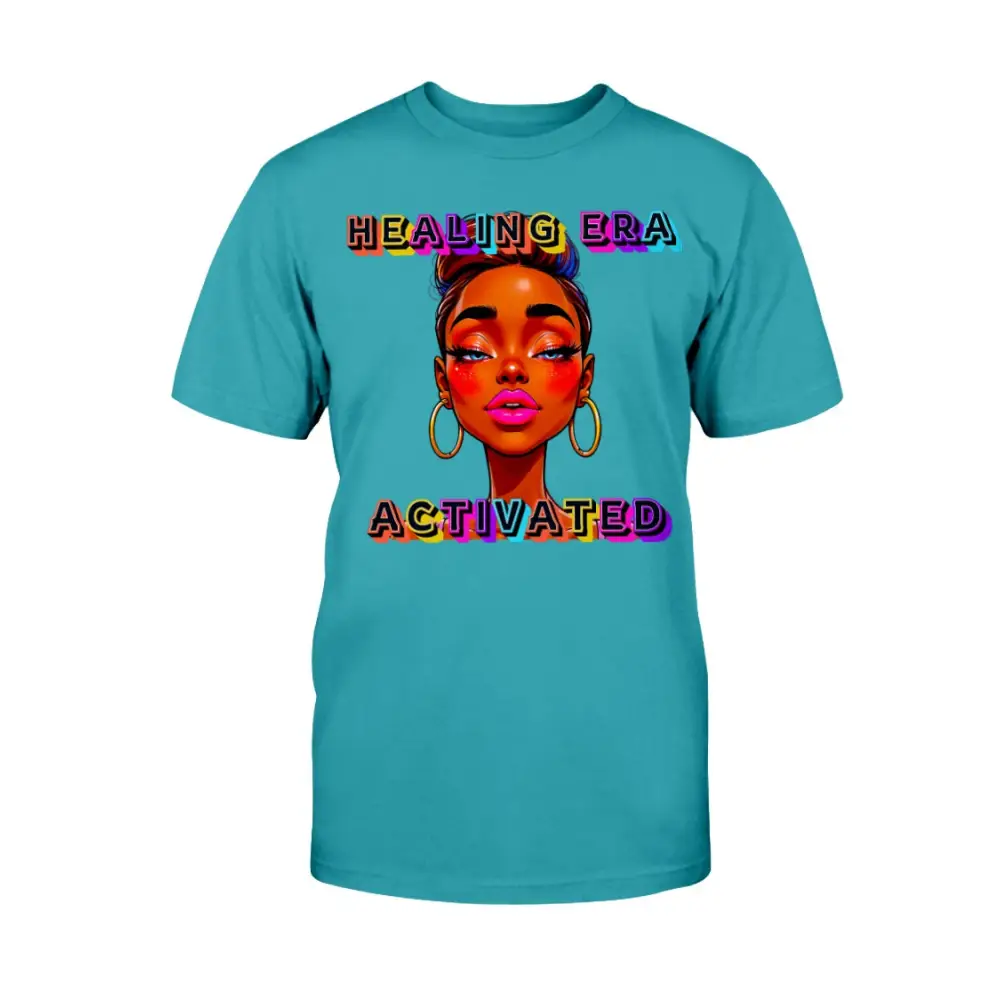 Turquoise t-shirt with a graphic of a woman's face and 'Healing Era Activated' text on a white background