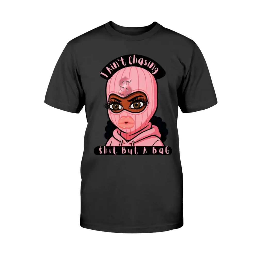 “Black t-shirt with cartoon baddie wearing a pink ski mask and hoodie, with text reading ‘I Ain’t Chasing Shit But a Bag’ in black and pink.”