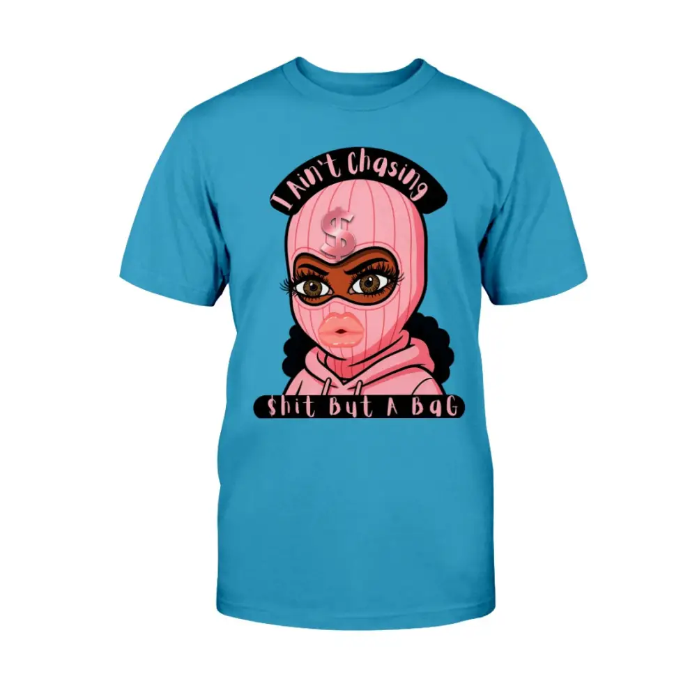 “Blue t-shirt with cartoon baddie wearing a pink ski mask and hoodie, with text reading ‘I Ain’t Chasing Shit But a Bag’ in black and pink.”