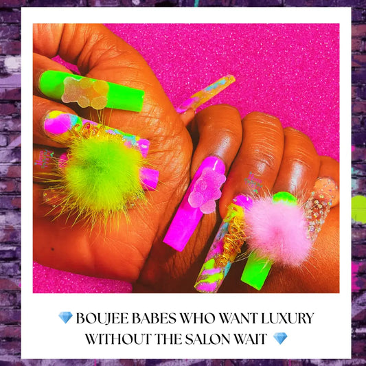 “Neon extra-long press on nails with fluffy pom-pom charms, gummy bear accents, rhinestones, and colorful candy-style designs displayed on dark-skinned hands against a pink glitter background.”