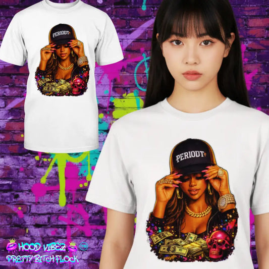 Person wearing a white t-shirt with a graphic design of a woman in a cap and jewelry, set against a colorful graffiti wall.