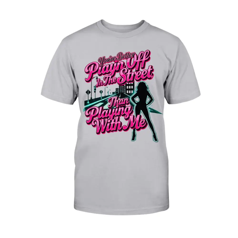Ash grey graphic t-shirt featuring bold pink statement text “You’re Better Playin’ In The Street Than Playing With Me” with urban city background and female silhouette design by Hood Vibez Pretty Bitch Flock.