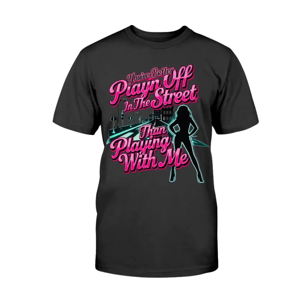 Black graphic t-shirt featuring bold pink statement text “You’re Better Playin’ In The Street Than Playing With Me” with urban city background and female silhouette design by Hood Vibez Pretty Bitch Flock.