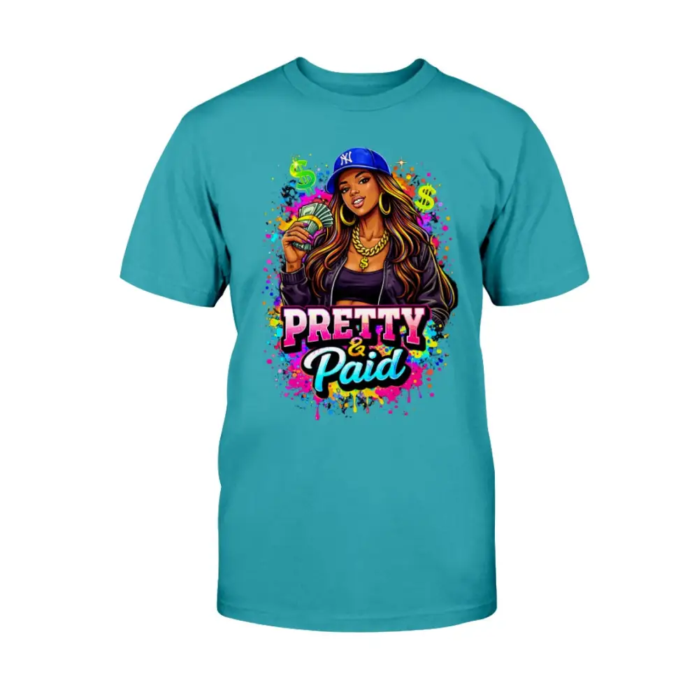 Pretty & Paid graphic t-shirt featuring urban boss babe holding cash, colorful street art background, and bold statement lettering on teal blue tee.