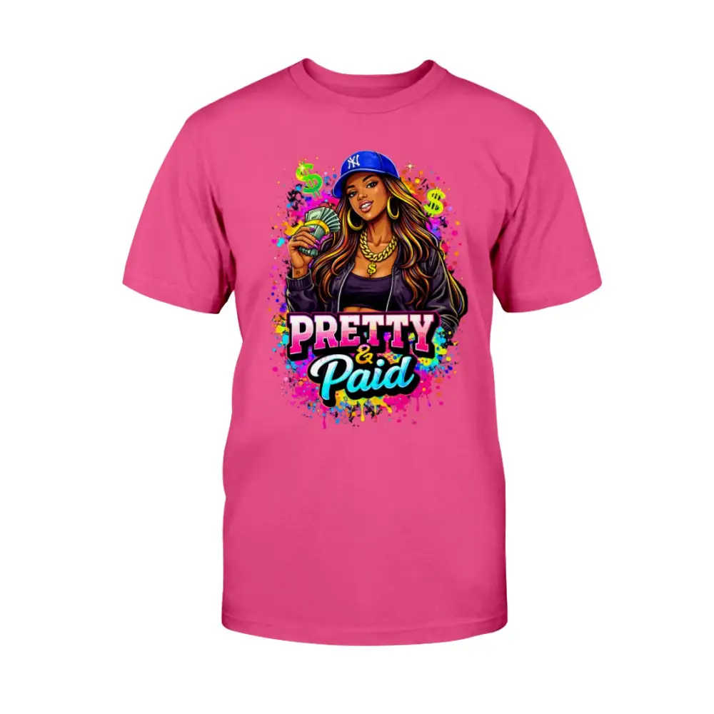 Pretty & Paid graphic t-shirt featuring urban boss babe holding cash, colorful street art background, and bold statement lettering on pink tee.