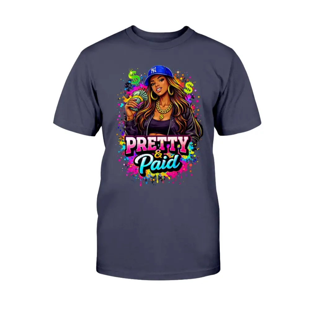 Pretty & Paid graphic t-shirt featuring urban boss babe holding cash, colorful street art background, and bold statement lettering on navy tee.