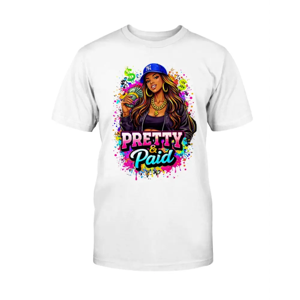 Pretty & Paid graphic t-shirt featuring urban boss babe holding cash, colorful street art background, and bold statement lettering on white tee.