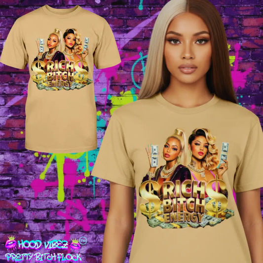 model wearing Rich Bitch Energy graphic tee featuring glamorous women holding cash, gold dollar signs, and luxury money graphics on a tan streetwear statement t-shirt.