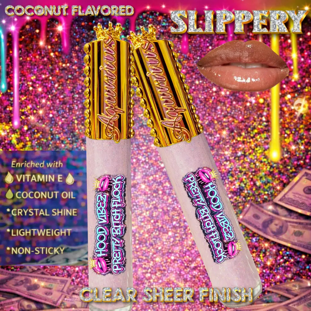 Two clear glitter-infused lip gloss tubes with gold caps displayed on an urban graffiti night background with cash and diamond accents, showcasing a high-shine, crystal-clear lip gloss.