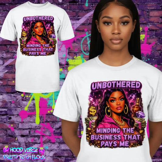 Unbothered & Minding the Business That Pays Me™ graphic tee featuring boss baddie artwork with money stacks, glam jewelry, and bold streetwear design on white t-shirt